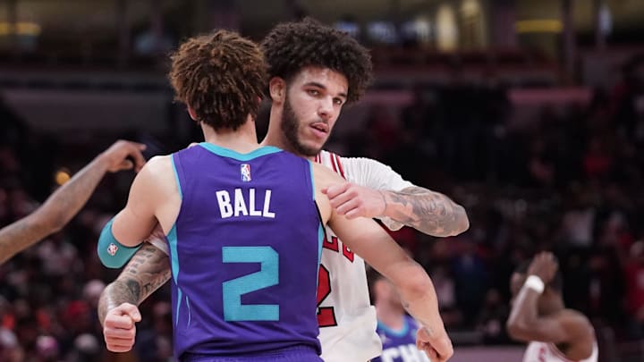 Nov 29, 2021; Chicago, Illinois, USA; Charlotte Hornets guard LaMelo Ball (2) and Chicago Bulls guard Lonzo Ball (2) hug after the game at United Center. Mandatory Credit: David Banks-Imagn Images