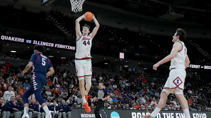 Mar 19, 2026; Greenville, SC, USA; Illinois Fighting Illini center Zvonimir Ivisic (44) dunks the ball against the Penn Quakers in the second half of a first round game of the men's 2026 NCAA Tournament at Bon Secours Wellness Arena. Mandatory Credit: Jim Dedmon-Imagn Images Mar 19, 2026; Greenville, SC, USA; Illinois Fighting Illini center Zvonimir Ivisic (44) dunks the ball against the Penn Quakers in the second half of a first round game of the men's 2026 NCAA Tournament at Bon Secours Wellness Arena. Mandatory Credit: Jim Dedmon-Imagn Images