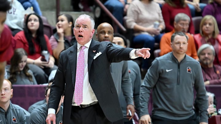 Feb 14, 2026; Blacksburg, Virginia, USA; Virginia Tech Hokies head coach Mike Young gives his team instructions during the first half at Cassell Coliseum. Mandatory Credit: Brian Bishop-Imagn Images