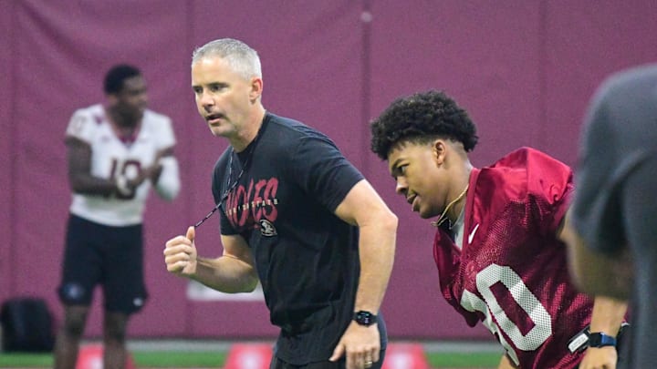 Florida State football football head coach Mike Norvell coaches players up during the final Tour of