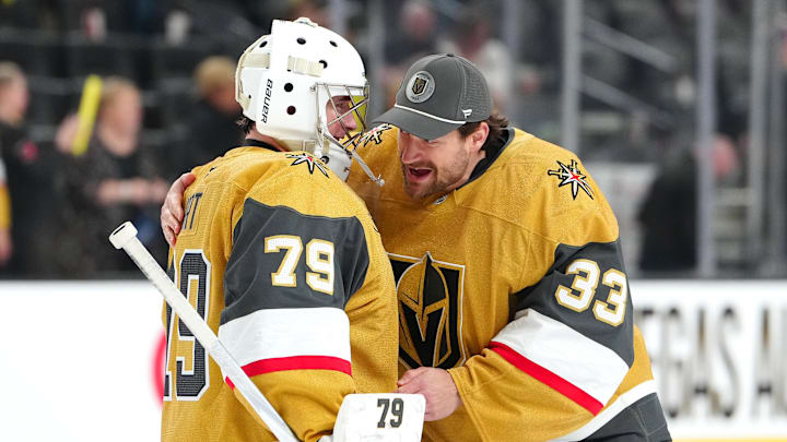 Apr 2, 2026; Las Vegas, Nevada, USA; Vegas Golden Knights goaltender Carter Hart (79) is congratulated by goaltender Adin Hill (33) after the Golden Knights defeated the Calgary Flames 6-3 at T-Mobile Arena. Mandatory Credit: Stephen R. Sylvanie-Imagn Images