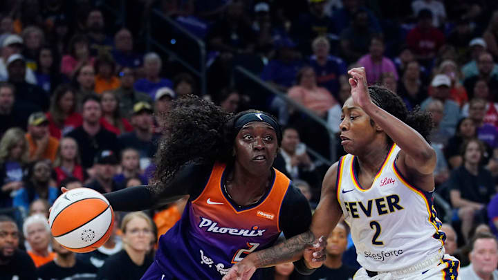 Mercury guard Kahleah Copper (2) drives against Fever guard Mari McDonald (2) at PHX Arena in Phoenix, on Aug. 7, 2025.