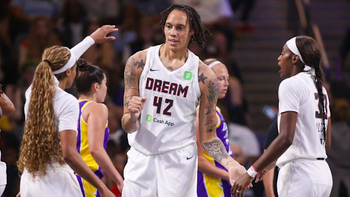 Sep 3, 2025; College Park, Georgia, USA; Atlanta Dream center Brittney Griner (42) reacts with teammates after a play against the Los Angeles Sparks in the first quarter at Gateway Center Arena at College Park. Mandatory Credit: Brett Davis-Imagn Images

