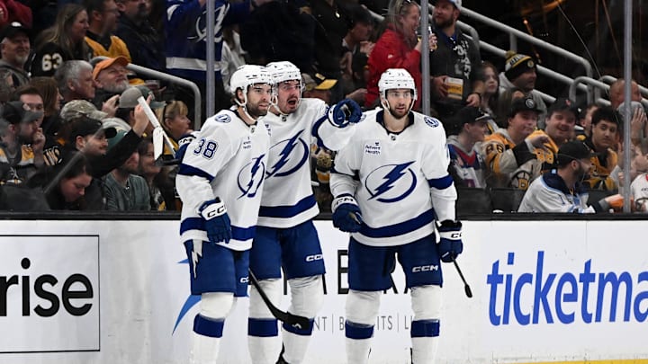Apr 11, 2026; Boston, Massachusetts, USA; Tampa Bay Lightning left wing Brandon Hagel (38) celebrates with his teammates after scoring a goal against the Boston Bruins during the third period at the TD Garden. Mandatory Credit: Brian Fluharty-Imagn Images