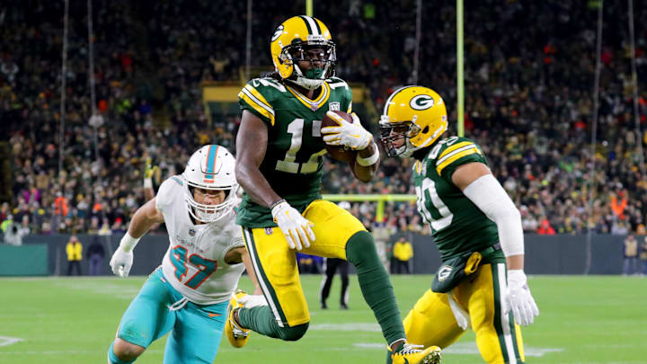 Green Bay Packers wide receiver Davante Adams scores a touchdown during the 3rd quarter of the Green Bay Packers game against the Miami Dolphins at Lambeau Field in Green Bay, Wis. on November 11, 2018. Green Bay Packers wide receiver Davante Adams scores a touchdown during the 3rd quarter of the Green Bay Packers game against the Miami Dolphins at Lambeau Field in Green Bay, Wis. on November 11, 2018.