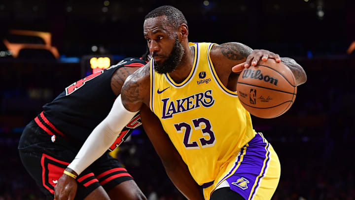 Jan 25, 2024; Los Angeles, California, USA; Los Angeles Lakers forward LeBron James (23) moves the ball against Chicago Bulls forward Patrick Williams (44) during the first half at Crypto.com Arena. Mandatory Credit: Gary A. Vasquez-Imagn Images