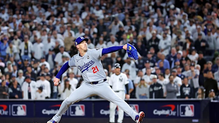 Oct 30, 2024; New York, New York, USA; Los Angeles Dodgers pitcher Walker Buehler (21) pitches during the ninth inning against the New York Yankees in game four of the 2024 MLB World Series at Yankee Stadium. Mandatory Credit: Brad Penner-Imagn Images Oct 30, 2024; New York, New York, USA; Los Angeles Dodgers pitcher Walker Buehler (21) pitches during the ninth inning against the New York Yankees in game four of the 2024 MLB World Series at Yankee Stadium. Mandatory Credit: Brad Penner-Imagn Images