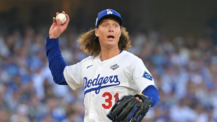 Oct. 27, 2025; Los Angeles, California, USA; Los Angeles Dodgers pitcher Tyler Glasnow (31) throws to first for an out against Toronto Blue Jays second baseman Bo Bichette (11) in the second inning during game three of the 2025 MLB World Series at Dodger Stadium. Oct. 27, 2025; Los Angeles, California, USA; Los Angeles Dodgers pitcher Tyler Glasnow (31) throws to first for an out against Toronto Blue Jays second baseman Bo Bichette (11) in the second inning during game three of the 2025 MLB World Series at Dodger Stadium.
