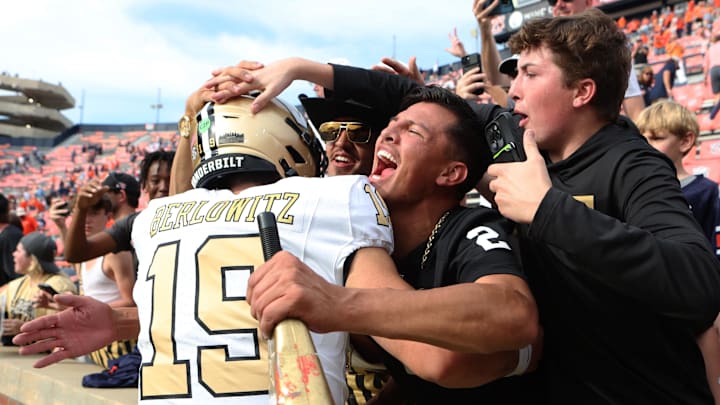 Nov 2, 2024; Auburn, Alabama, USA;  Vanderbilt Commodores quarterback Blaze Berlowitz (19) celebrates with fans after the Commodores beat the Auburn Tigers at Jordan-Hare Stadium. Mandatory Credit: John Reed-Imagn Images