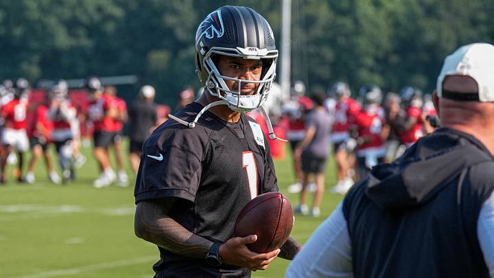 Jul 30, 2026; Atlanta, Falcons, USA; Atlanta Falcons quarterback Tua Tagovailoa (1) shown on the field during training camp at IBM Performance Field. Mandatory Credit: Dale Zanine-Imagn Images Jul 30, 2026; Atlanta, Falcons, USA; Atlanta Falcons quarterback Tua Tagovailoa (1) shown on the field during training camp at IBM Performance Field. Mandatory Credit: Dale Zanine-Imagn Images