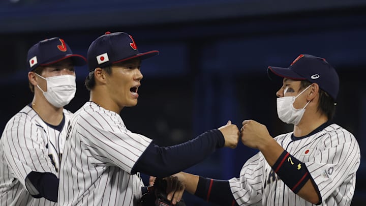 Aug 4, 2021; Yokohama, Japan; Team Japan pitcher Yoshinobu Yamamoto (17) celebrates after retiring