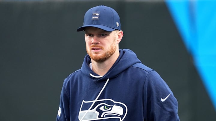 Dec 28, 2025; Charlotte, North Carolina, USA; Seattle Seahawks quarterback Sam Darnold (14) warms up before the game against the Carolina Panthers at Bank of America Stadium. Mandatory Credit: Jim Dedmon-Imagn Images