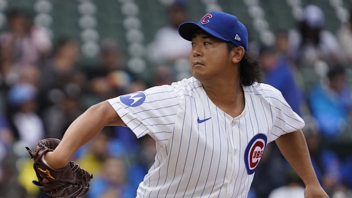 Sep 22, 2024; Chicago, Illinois, USA; Chicago Cubs pitcher Shota Imanaga (18) throws the ball against the Washington Nationals during the first inning at Wrigley Field. Mandatory Credit: David Banks-Imagn Images
