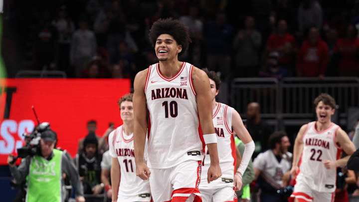 Mar 14, 2026; Kansas City, MO, USA; Arizona Wildcats forward Koa Peat (10) reacts after defeating the Houston Cougars during the men's Big 12 Conference Tournament Championship at T-Mobile Center. Mandatory Credit: William Purnell-Imagn Images Mar 14, 2026; Kansas City, MO, USA; Arizona Wildcats forward Koa Peat (10) reacts after defeating the Houston Cougars during the men's Big 12 Conference Tournament Championship at T-Mobile Center. Mandatory Credit: William Purnell-Imagn Images