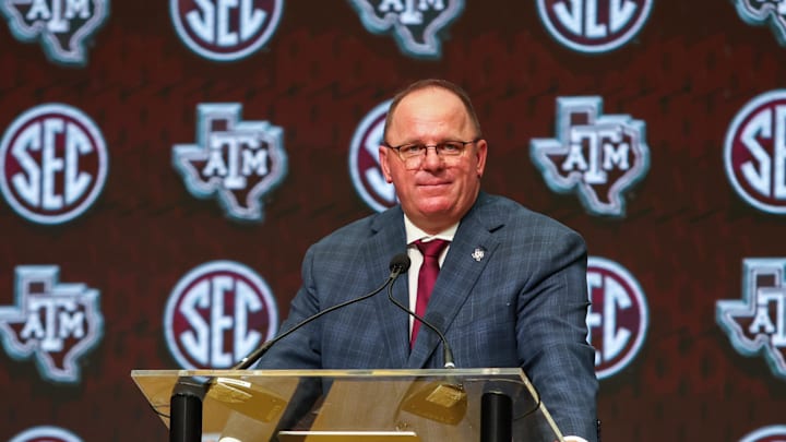 Jul 17, 2025; Atlanta, GA, USA; Texas A&M Aggies head coach Mike Elko talks to the media during the SEC Media Days at Omni Atlanta Hotel. Mandatory Credit: Jordan Godfree-Imagn Images