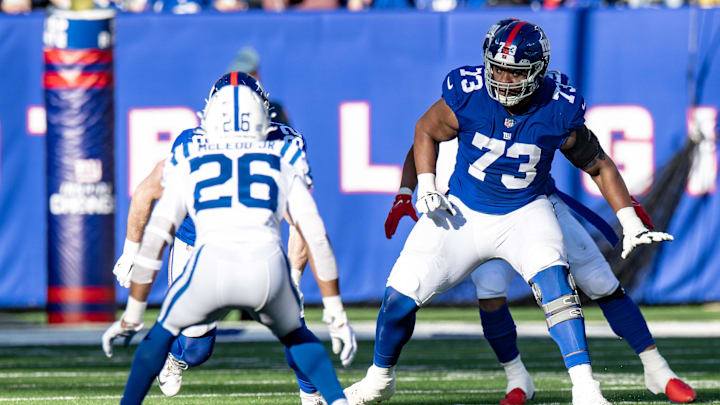 Jan 1, 2023; East Rutherford, New Jersey, USA; New York Giants offensive tackle Evan Neal (73) pass protects against the Indianapolis Colts during the first half at MetLife Stadium. Mandatory Credit: John Jones-Imagn Images
