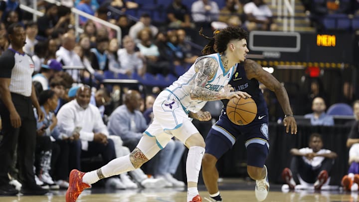 Oct 15, 2025; Greensboro, North Carolina, USA; Charlotte Hornets guard LaMelo Ball (1) dribbles the ball during the second half against the Memphis Grizzlies at First Horizon Coliseum. Mandatory Credit: Brian Westerholt-Imagn Images