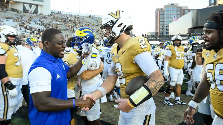 Sep 12, 2026; Nashville, Tennessee, USA;  Vanderbilt Commodores quarterback Jared Curtis (2) celebrates the win after their game against the Delaware Blue Hens at FirstBank Stadium.  Mandatory Credit: Steve Roberts-Imagn Images