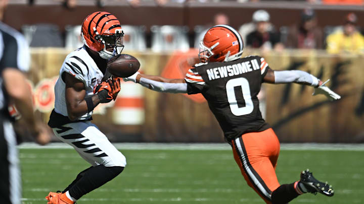 Sep 7, 2025; Cleveland, Ohio, USA; Cincinnati Bengals wide receiver Ja'Marr Chase (1) drops a pass defended by Cleveland Browns cornerback Greg Newsome II (0) during the second half at Huntington Bank Field. Mandatory Credit: Ken Blaze-Imagn Images Sep 7, 2025; Cleveland, Ohio, USA; Cincinnati Bengals wide receiver Ja'Marr Chase (1) drops a pass defended by Cleveland Browns cornerback Greg Newsome II (0) during the second half at Huntington Bank Field. Mandatory Credit: Ken Blaze-Imagn Images