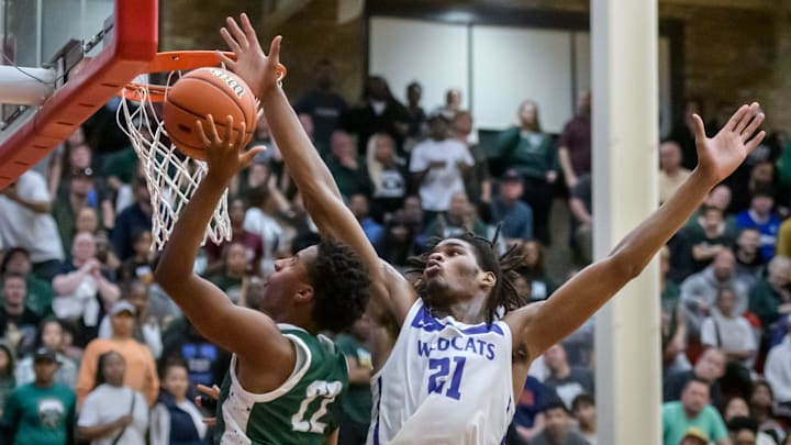 Richwoods' Marlon Herron goes to the basket against Harvey Thornton's Morez Johnson Jr. late in the second half of their Class 3A boys basketball supersectional Monday, March 4, 2024 at Ottawa High School. The Knights advanced to the state semifinals with a 58-52 win.