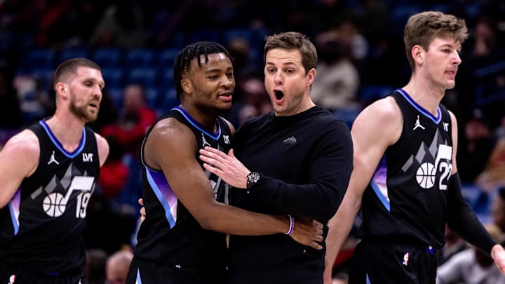 Jan 20, 2025; New Orleans, Louisiana, USA;  Utah Jazz head coach Will Hardy talks to guard Isaiah Collier (13) on a time out agains the New Orleans Pelicans during the second half at Smoothie King Center. Mandatory Credit: Stephen Lew-Imagn Images