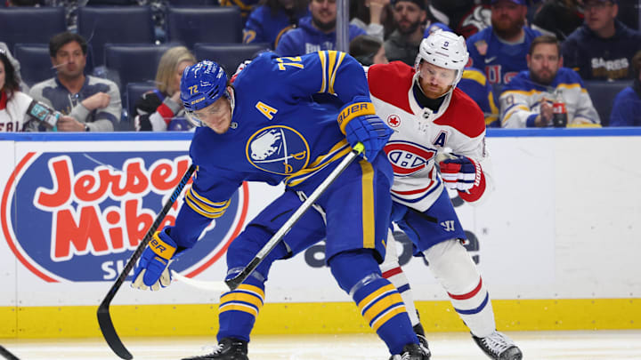 May 8, 2026; Buffalo, New York, USA; Buffalo Sabres center Tage Thompson (72) looks to control the puck as Montréal Canadiens defenseman Mike Matheson (8) defends during the second period in game two of the second round of the 2026 Stanley Cup Playoffs at KeyBank Center. Mandatory Credit: Timothy T. Ludwig-Imagn Images