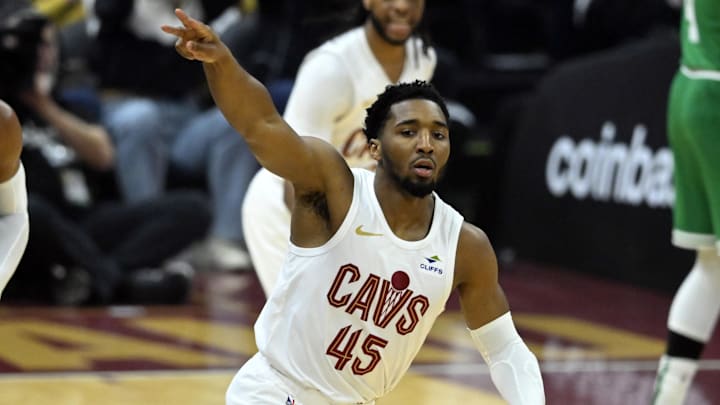 May 11, 2024; Cleveland, Ohio, USA; Cleveland Cavaliers guard Donovan Mitchell (45) celebrates after making a three-point basket against the Boston Celtics in the first quarter of game three of the second round of the 2024 NBA playoffs at Rocket Mortgage FieldHouse. Mandatory Credit: David Richard-Imagn Images