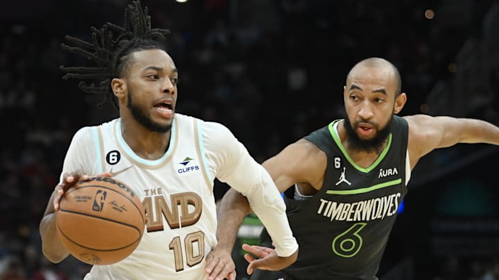 Nov 13, 2022; Cleveland, Ohio, USA; Cleveland Cavaliers guard Darius Garland (10) drives to the basket against Minnesota Timberwolves guard Jordan McLaughlin (6) during the second half at Rocket Mortgage FieldHouse. Mandatory Credit: Ken Blaze-Imagn Images