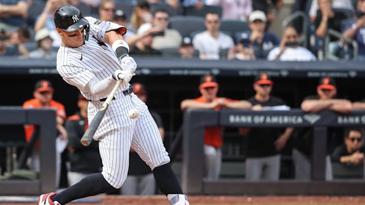 Sep 27, 2025; Bronx, New York, USA;  New York Yankees right fielder Aaron Judge (99) hits a two run single in the fifth inning against the Baltimore Orioles at Yankee Stadium. Mandatory Credit: Wendell Cruz-Imagn Images