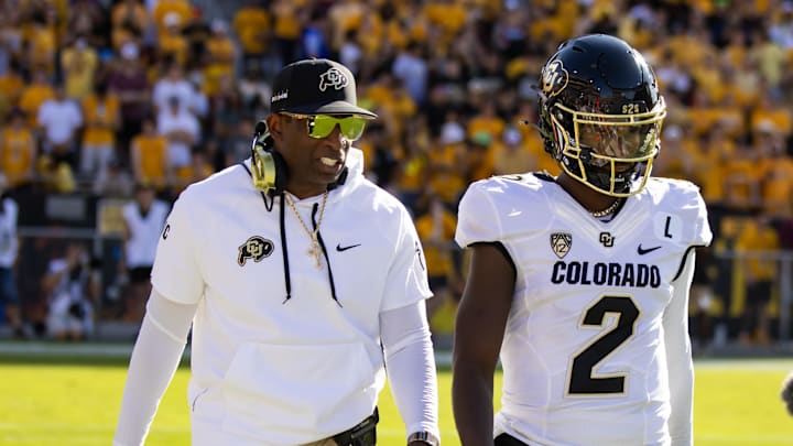 Deion and Shedeur Sanders during Colorado's 27–24 win over Arizona State on Oct. 7, 2023.