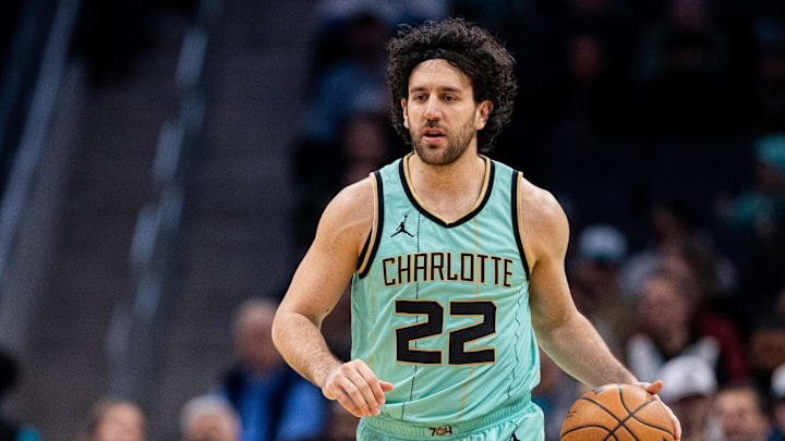 Jan 24, 2025; Charlotte, North Carolina, USA; Charlotte Hornets guard Vasilije Micic (22) brings the ball up court against the Portland Trail Blazers during the second quarter at Spectrum Center. Mandatory Credit: Scott Kinser-Imagn Images