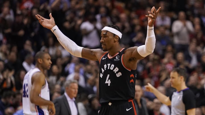 Jan 22, 2020; Toronto, Ontario, CAN; Toronto Raptors forward Rondae Hollis-Jefferson (4) celebrates a play against the Philadelphia 76ers at Scotiabank Arena. Toronto defeated Philadelphia. Mandatory Credit: John E. Sokolowski-USA TODAY Sports