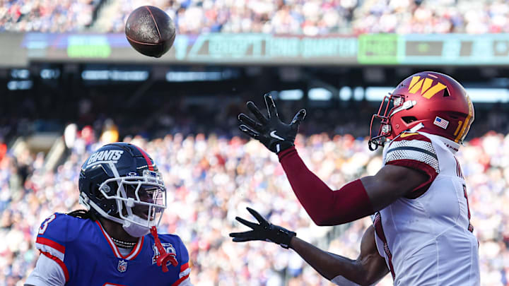Nov 3, 2024; East Rutherford, New Jersey, USA; Washington Commanders wide receiver Terry McLaurin (17) catches a touchdown pass as New York Giants cornerback Deonte Banks (3) defends during the first half at MetLife Stadium. Mandatory Credit: Vincent Carchietta-Imagn Images Nov 3, 2024; East Rutherford, New Jersey, USA; Washington Commanders wide receiver Terry McLaurin (17) catches a touchdown pass as New York Giants cornerback Deonte Banks (3) defends during the first half at MetLife Stadium. Mandatory Credit: Vincent Carchietta-Imagn Images
