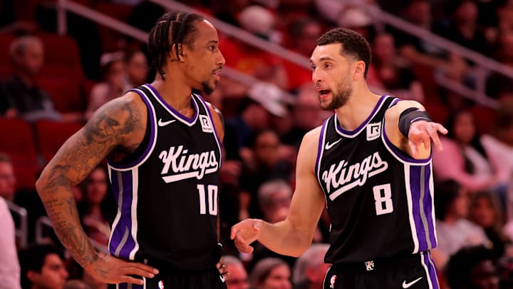 Mar 1, 2025; Houston, Texas, USA; Sacramento Kings forward DeMar DeRozan (10) talks with guard Zach LaVine (8) during a timeout against the Houston Rockets during the third quarter at Toyota Center. Mandatory Credit: Erik Williams-Imagn Images
