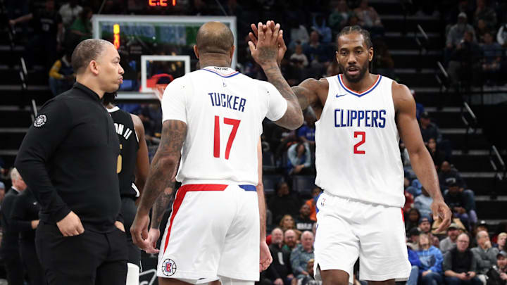 Feb 23, 2024; Memphis, Tennessee, USA; Los Angeles Clippers forward P.J. Tucker (17) reacts with Los Angeles Clippers forward Kawhi Leonard (2) after a basket to end the third quarter against the Memphis Grizzlies at FedExForum. Mandatory Credit: Petre Thomas-Imagn Images