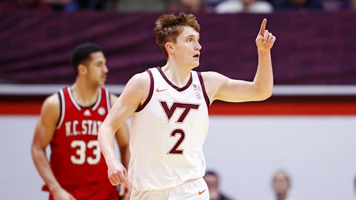 Jan 15, 2025; Blacksburg, Virginia, USA; Virginia Tech Hokies guard Jaden Schutt (2) celerbates after making a three pointer during the second half against the North Carolina State Wolfpack at Cassell Coliseum. Mandatory Credit: Peter Casey-Imagn Images Jan 15, 2025; Blacksburg, Virginia, USA; Virginia Tech Hokies guard Jaden Schutt (2) celerbates after making a three pointer during the second half against the North Carolina State Wolfpack at Cassell Coliseum. Mandatory Credit: Peter Casey-Imagn Images