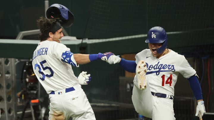 Oct 18, 2020; Arlington, Texas, USA; Los Angeles Dodgers center fielder Cody Bellinger (35) celebrates with Los Angeles Dodgers second baseman Enrique Hernandez (14) after hitting a home run during the seventh inning against the Atlanta Braves during game seven of the 2020 NLCS at Globe Life Field. Mandatory Credit: Kevin Jairaj-Imagn Images