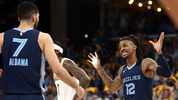 Apr 16, 2023; Memphis, Tennessee, USA; Memphis Grizzlies guard Ja Morant (12) talks with Memphis Grizzlies forward Santi Aldama (7) during the first half during game one of the 2023 NBA playoffs against the Los Angeles Lakers at FedExForum. Mandatory Credit: Petre Thomas-Imagn Images