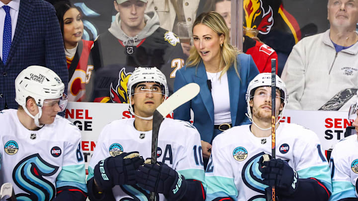 Feb 8, 2025; Calgary, Alberta, CAN; Seattle Kraken assistant coach Jessica Campbell on her bench during the first period against the Calgary Flames at Scotiabank Saddledome. Mandatory Credit: Sergei Belski-Imagn Images