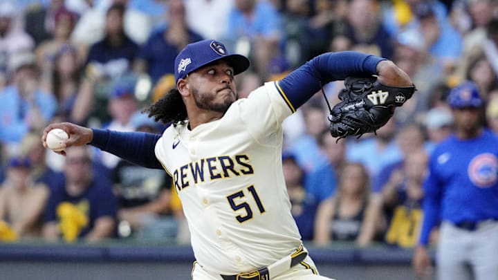 Oct 4, 2025; Milwaukee, Wisconsin, USA; Milwaukee Brewers starting pitcher Freddy Peralta (51) pitches against the Chicago Cubs during the second inning of game one of the NLDS round for the 2025 MLB playoffs at American Family Field. Mandatory Credit: Michael McLoone-Imagn Images