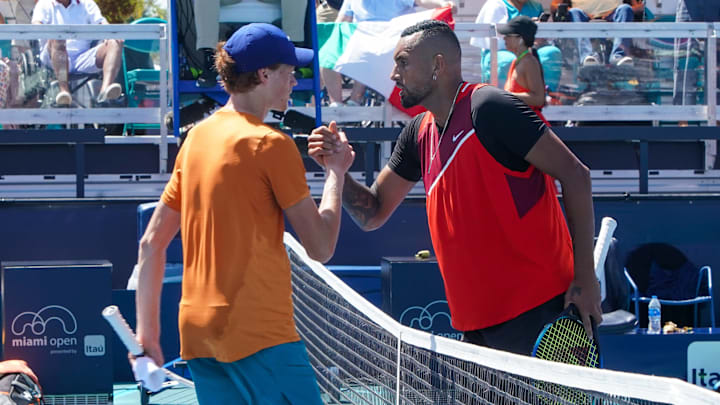 Jannik Sinner and Nick Kyrgios shake hands at the net at the 2022 Miami Open.