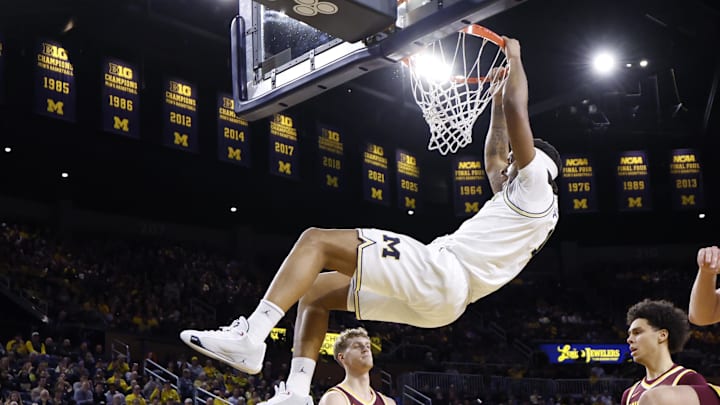 Feb 24, 2026; Ann Arbor, Michigan, USA; Michigan Wolverines guard Roddy Gayle Jr. (11) ducks in the first half against the Minnesota Golden Gophers at Crisler Center. Mandatory Credit: Rick Osentoski-Imagn Images