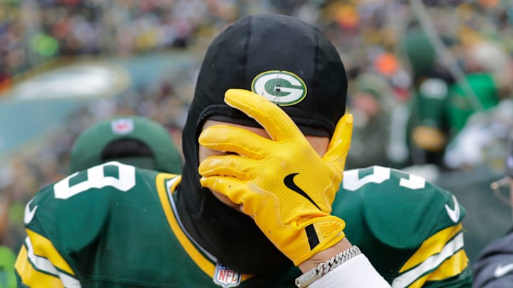 Green Bay Packers wide receiver Christian Watson (9) leaves the field on a cart after getting injured against the Chicago Bears in the second quarter during their football game Sunday, January 5, 2025, at Lambeau Field in Green Bay, Wisconsin.