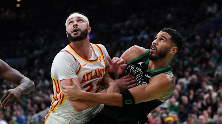Nov 12, 2024; Boston, Massachusetts, USA; Atlanta Hawks forward Larry Nance Jr. (22) and Boston Celtics forward Jayson Tatum (0) work for the rebound in the second quarter at TD Garden. Mandatory Credit: David Butler II-Imagn Images Nov 12, 2024; Boston, Massachusetts, USA; Atlanta Hawks forward Larry Nance Jr. (22) and Boston Celtics forward Jayson Tatum (0) work for the rebound in the second quarter at TD Garden. Mandatory Credit: David Butler II-Imagn Images
