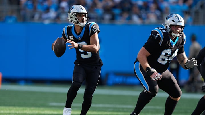 Nov 9, 2025; Charlotte, North Carolina, USA;  Carolina Panthers quarterback Bryce Young (9) looks to pass during the third quarter against the New Orleans Saints at Bank of America Stadium. Mandatory Credit: Jim Dedmon-Imagn Images