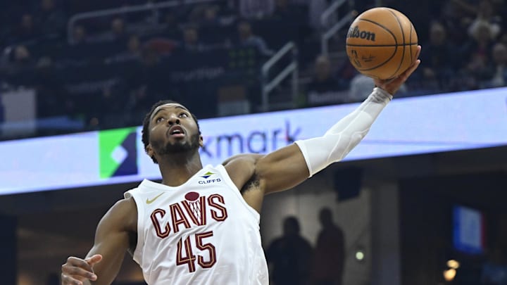 Dec 3, 2025; Cleveland, Ohio, USA; Cleveland Cavaliers guard Donovan Mitchell (45) rebounds in the first quarter against the Portland Trail Blazers at Rocket Arena. Mandatory Credit: David Richard-Imagn Images Dec 3, 2025; Cleveland, Ohio, USA; Cleveland Cavaliers guard Donovan Mitchell (45) rebounds in the first quarter against the Portland Trail Blazers at Rocket Arena. Mandatory Credit: David Richard-Imagn Images