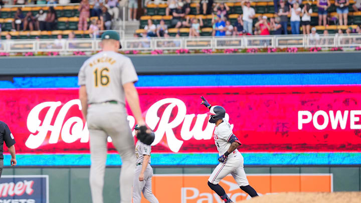 Minnesota Twins shortstop Carlos Correa (4) celebrates his home run against the Oakland Athletics pitcher Sean Newcomb (16) in the seventh inning at Target Field in Minneapolis on June 13, 2024. 