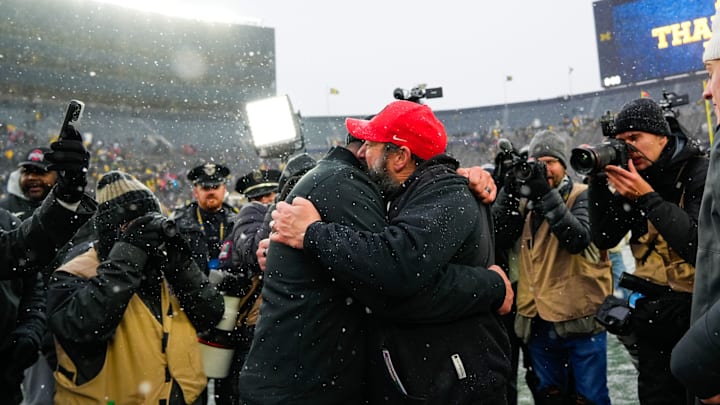 Ohio State Buckeyes head coach Ryan Day embraces defensive coordinator Matt Patricia after defeating the Michigan Wolverines in the NCAA football game at Michigan Stadium on Saturday, Nov. 29, 2025 in Ann Arbor, Michigan. Ohio State Buckeyes head coach Ryan Day embraces defensive coordinator Matt Patricia after defeating the Michigan Wolverines in the NCAA football game at Michigan Stadium on Saturday, Nov. 29, 2025 in Ann Arbor, Michigan.