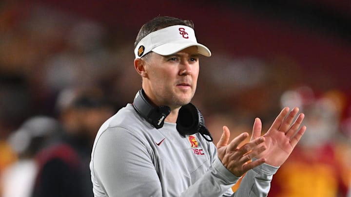 Oct 1, 2022; Los Angeles, California, USA; USC Trojans head coach Lincoln Riley applauds after a touchdown in the first half against the Arizona State Sun Devils at United Airlines Field at the Los Angeles Memorial Coliseum. Mandatory Credit: Jayne Kamin-Oncea-Imagn Images Oct 1, 2022; Los Angeles, California, USA; USC Trojans head coach Lincoln Riley applauds after a touchdown in the first half against the Arizona State Sun Devils at United Airlines Field at the Los Angeles Memorial Coliseum. Mandatory Credit: Jayne Kamin-Oncea-Imagn Images