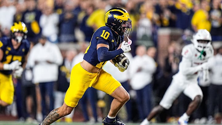 Michigan wide receiver Kendrick Bell (10) runs for a first down against New Mexico during the second half at Michigan Stadium in Ann Arbor on Saturday, August 30, 2025.